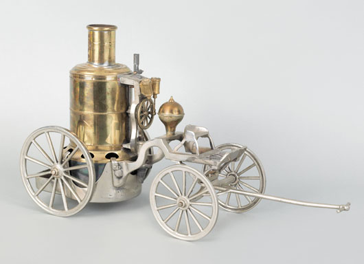 Brass and steel model of a steam fire engine, circa 1900, inscribed Weedens Upright Engine No 2 Patented May 19, 1885, 10 inches high x 18 inches wide. Image courtesy of Pook & Pook Inc.